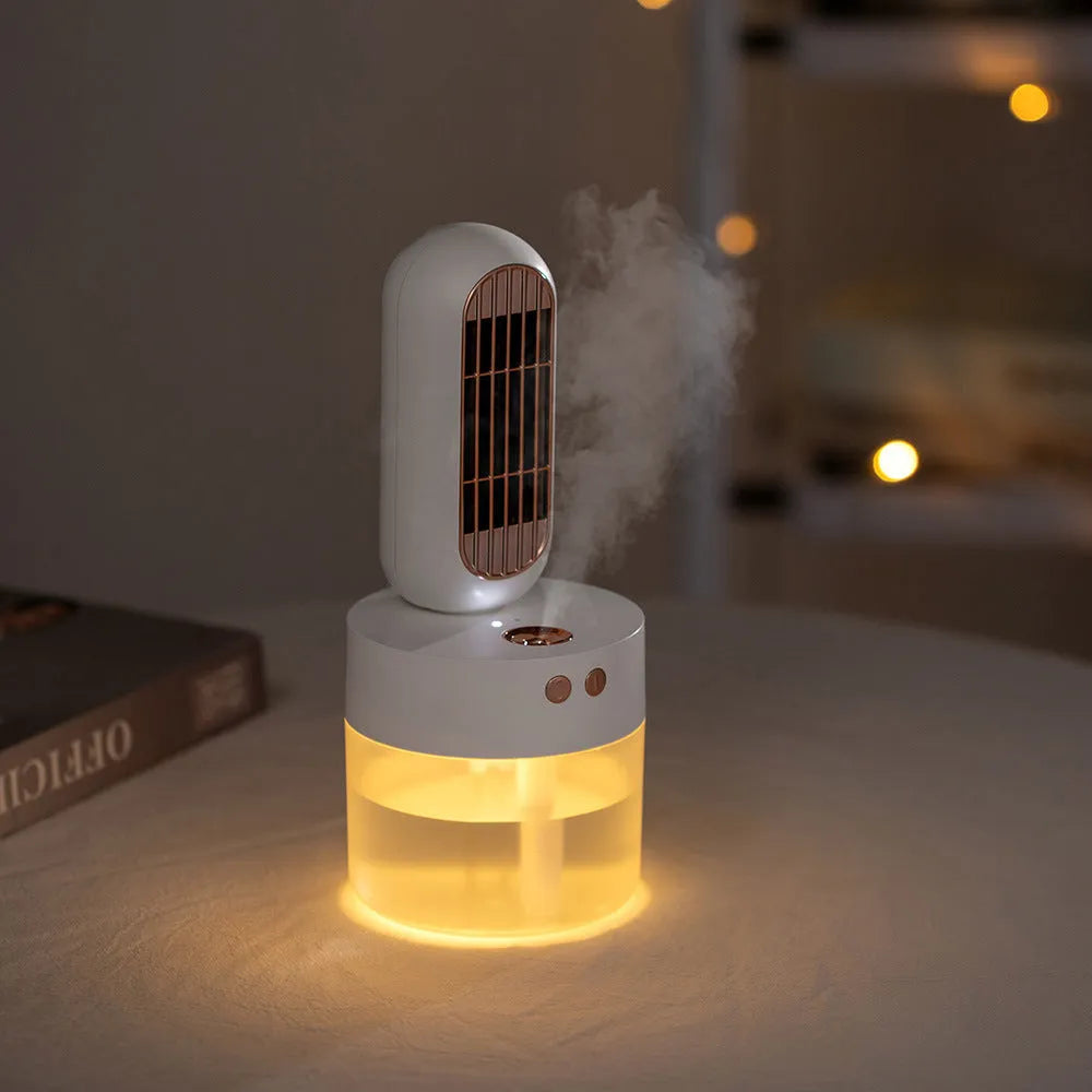 Small black and white oscillating humidifier fan with mechanical controls and charging capability