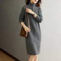 Woolen skirt with half zip closure and stand collar in casual midi length with loose fit