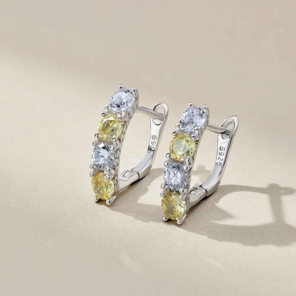 U-shaped zircon inlaid 925 silver female earrings in platinum yellow white diamond colour on white background