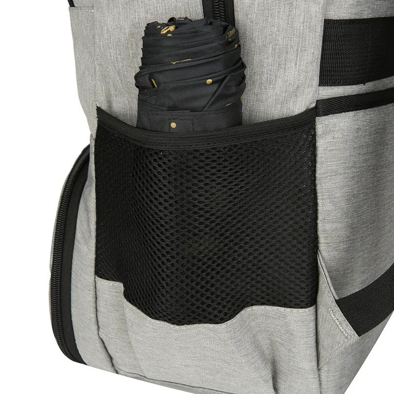 Light grey insulated Oxford cloth backpack with curved shoulder straps and multiple compartments.