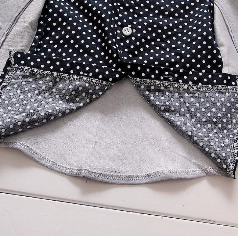 Casual blue kids sport suit set with short sleeves and elasticated waist shorts on a hanger