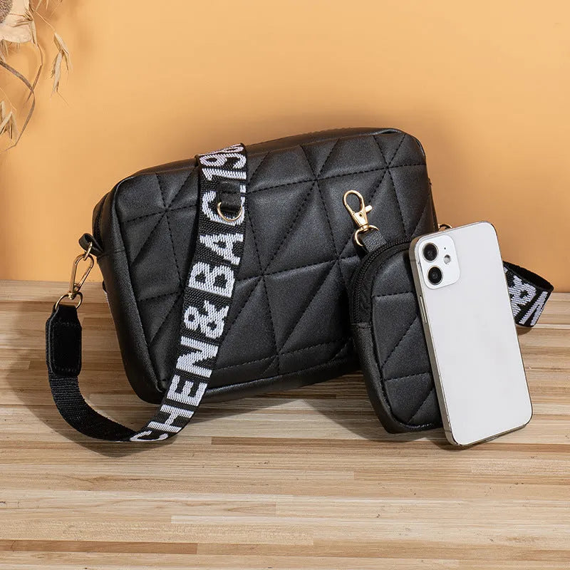Women's two-piece PU leather messenger bag set in apricot with embroidery and lock detail, horizontal square shape