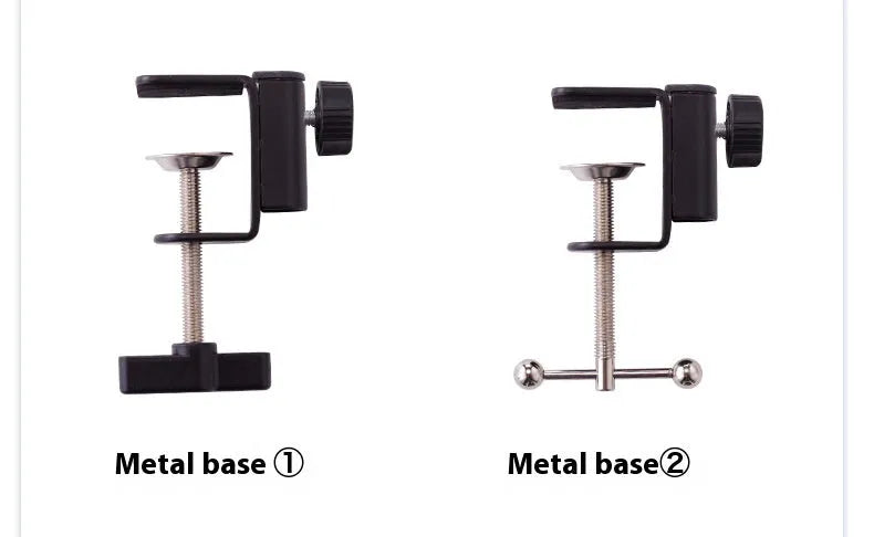 Black foldable metal cantilever bracket holding a tablet on a desktop, showing adjustable arms and clip.