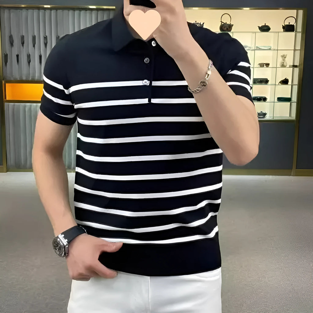 Man wearing a black and white striped knit t-shirt with a lapel collar, casual pullover style.