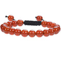 Women's flat knot braided healing bracelet with hand-woven aquamarine beads and geometric patterns