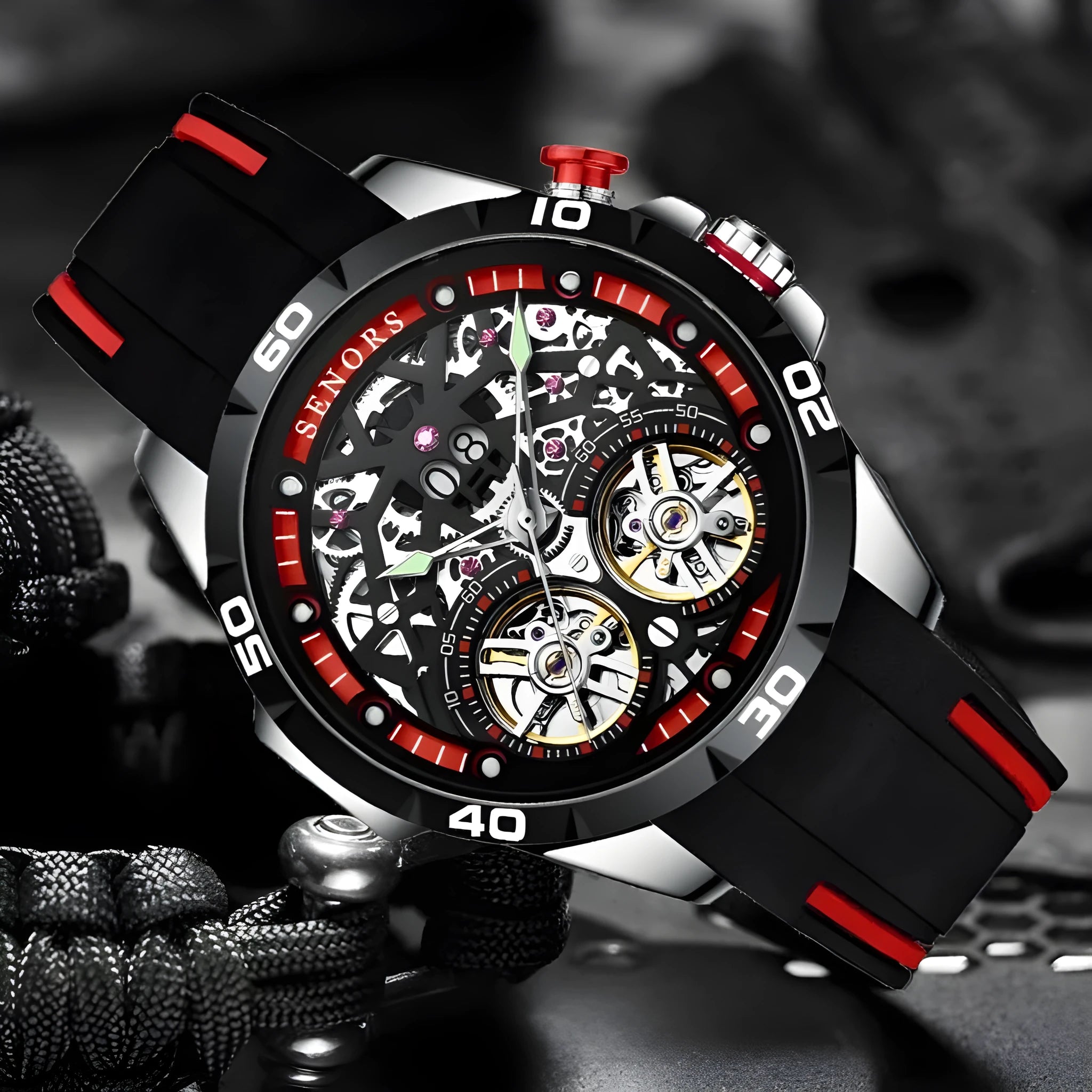 Men's red and blue automatic mechanical watch with luminous hands and hollow skeleton dial on display.