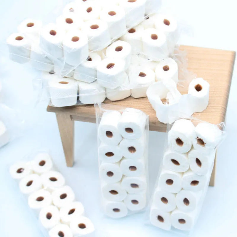 Miniature brown paper toilet paper roll model for childrens toys, size 30mm by 15mm by 80mm.