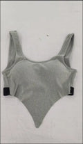 Solid colour polyester fibre sports bra in Black, Grey, Pink, or White for gym and yoga support