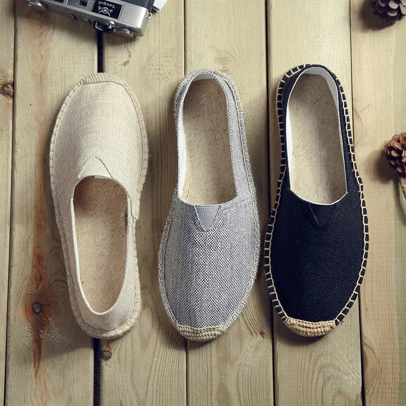 Men's solid colour canvas casual shoes with round toe in black, grey, white, dark brown, or light brown.