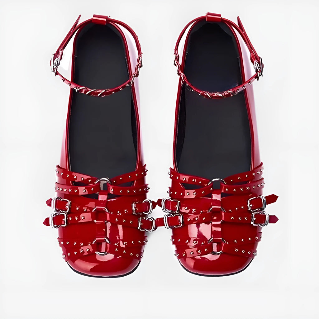Women's black genuine leather low-heel pumps with a buckle and square toe.