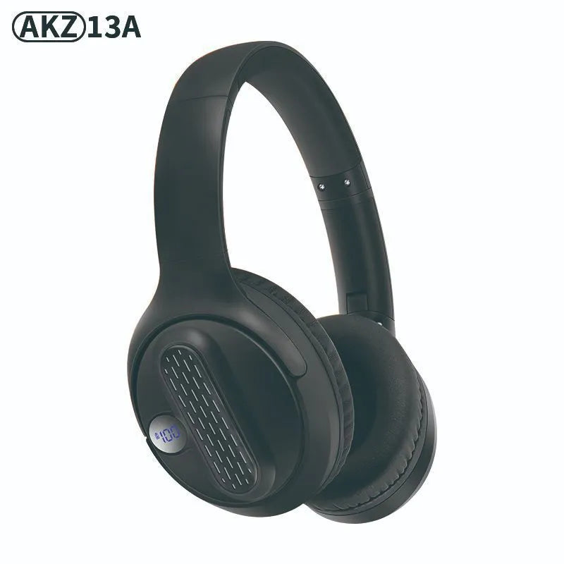 Retro wireless Bluetooth earphones with orange plastic shell, foldable headband, and digital display