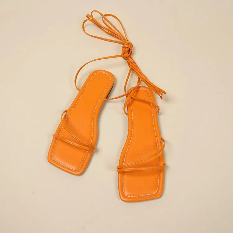 Women's flat sandals with ankle ring bandage cloth and front lace-up, shown in three colours.