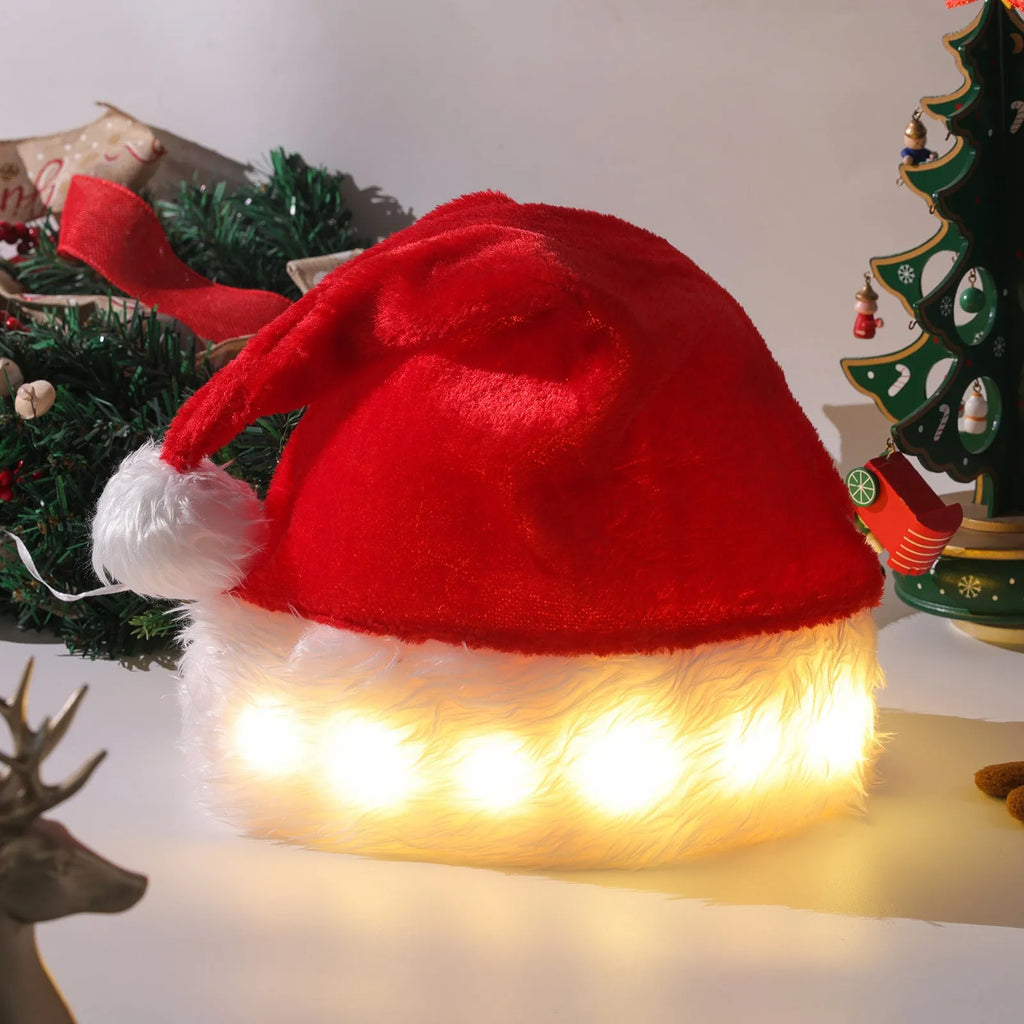 Red and white plush Santa hat with twinkling LED lights glowing in Christmas colours