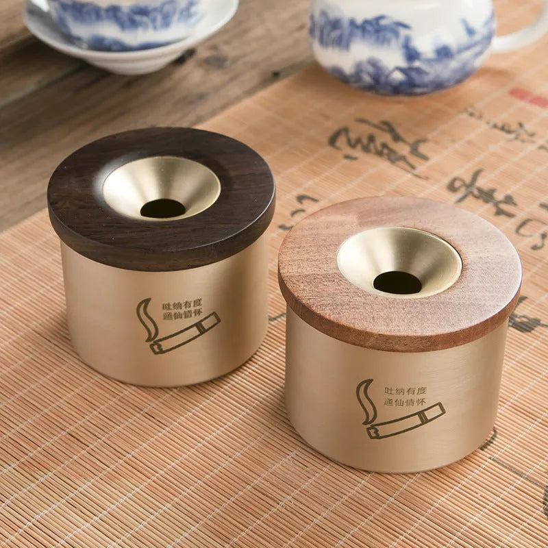 Retro solid copper ashtray with a wooden lid featuring a centre hole, shown with black and red wood options.