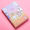 Small white Kaba Bear magnetic buckle notebook with 224 pages, showing compact 135mm x 185mm size.