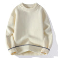 Man wearing a grey loose-fit round neck men's pullover sweater.