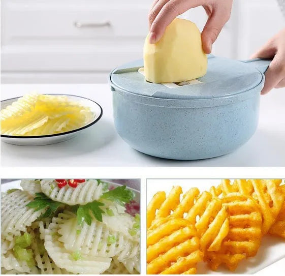 Blue 8-in-1 mandoline slicer with stainless steel blades, container, hand protector, and drain basket on kitchen counter