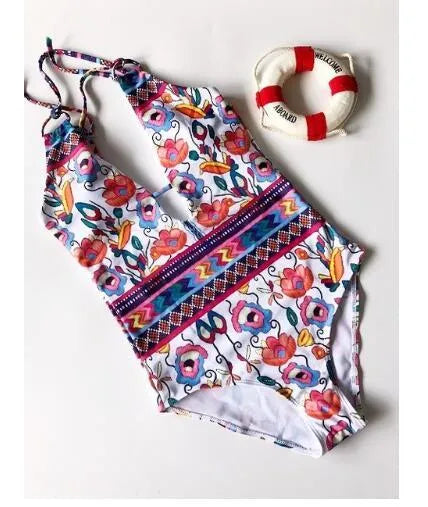 Bandage one-piece swimsuit with floral pattern, open back, chest pad, polyester and cotton lining, sizes S-XL.