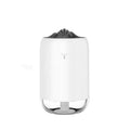 Mini cylindrical USB humidifier in turquoise green with water tank and mist outlet