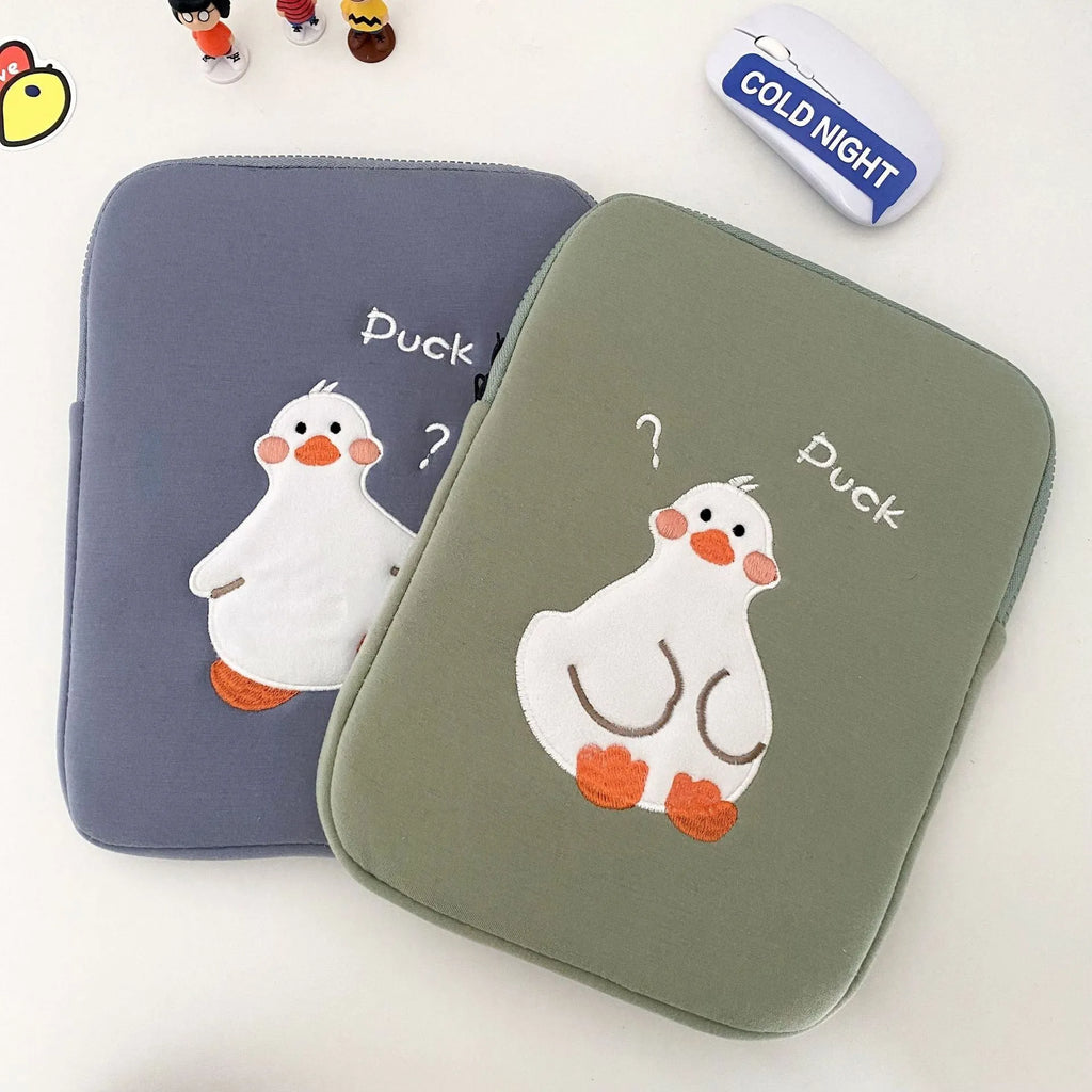 Blue tablet case with embroidered cartoon duck design and a silver zipper closure.