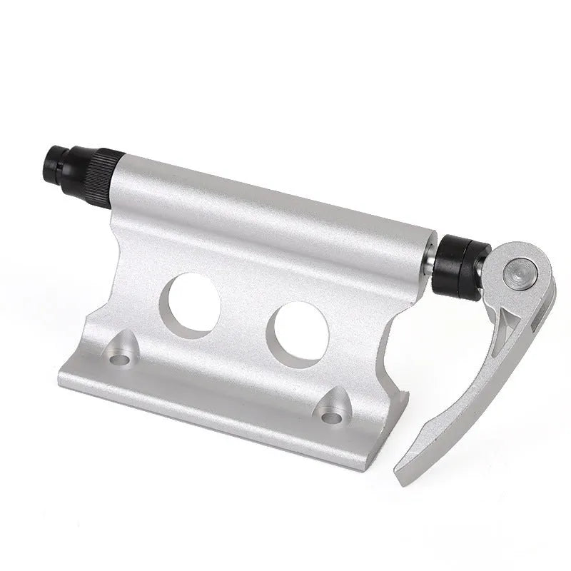 Silver metal bicycle front fork quick-release fixing clip for secure transport