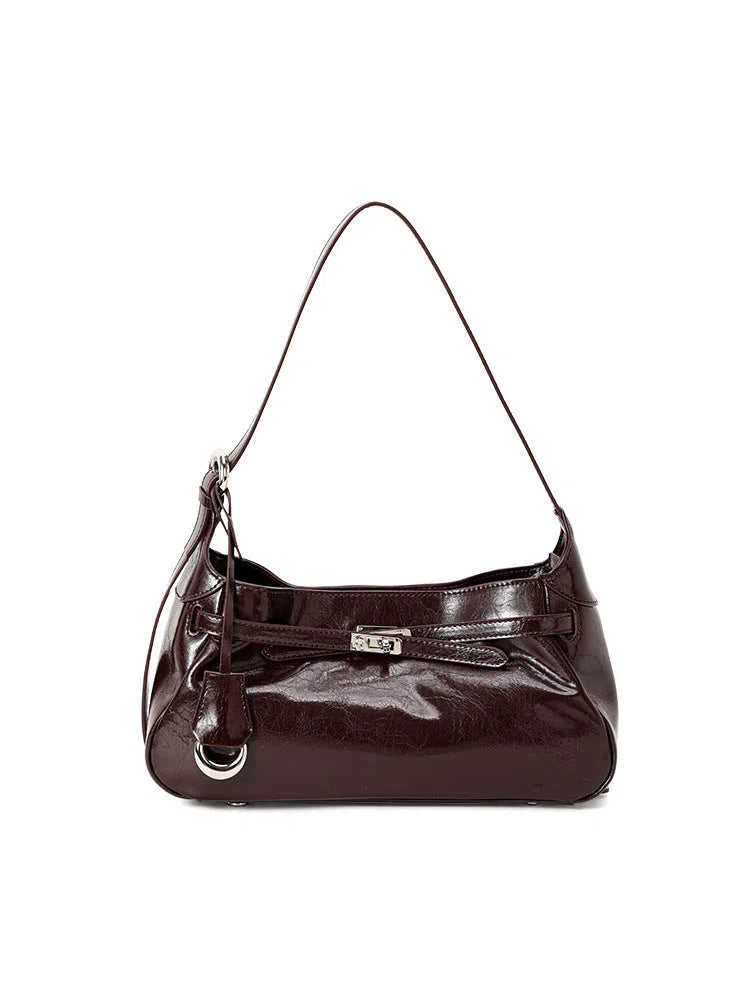 Soft genuine leather horizontal square crossbody bag with stitching detail, available in black, brown, and coffee for daily commuting