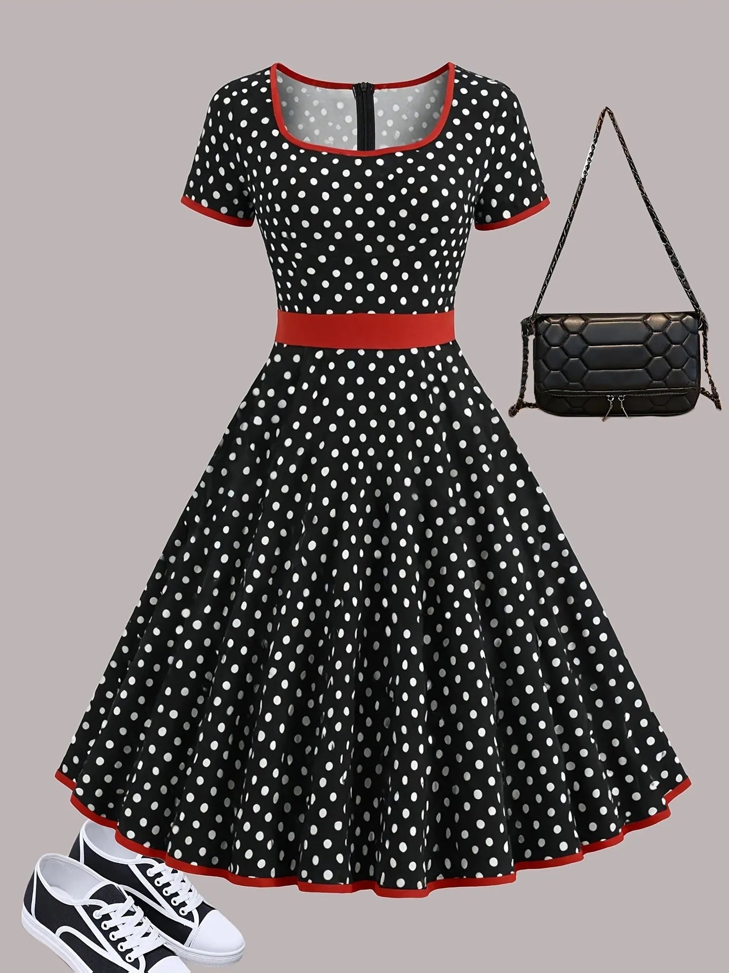Multicolour polka dot dress with square neckline, short sleeves, front zip, and a pleated midi skirt.