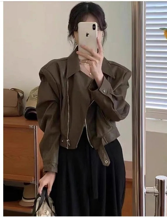 Brown women's retro slim fit leather-look jacket with pockets, short 40cm length.