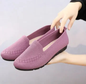 Female slip-on shoes in black, fuchsia, pink, and purple, sizes 35-42