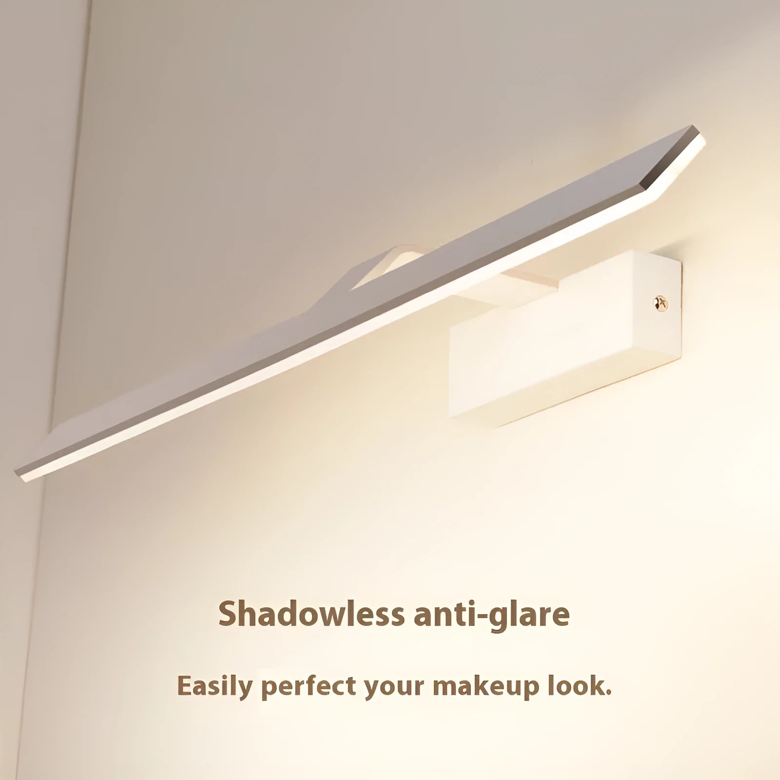 White 520mm long LED bathroom light bar mounted above a mirror, showing even illumination.