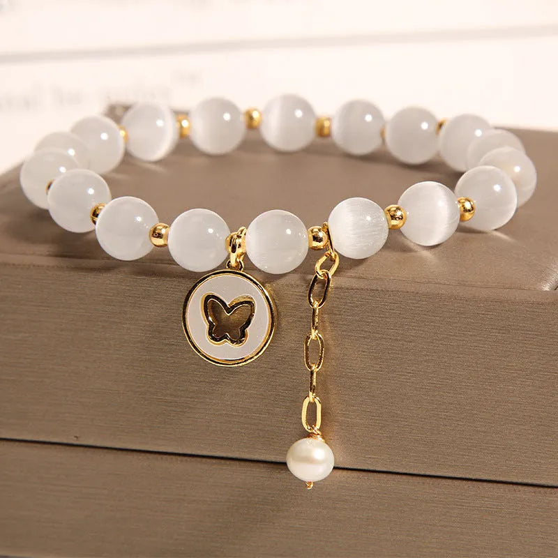 White cat's eye crystal geometric bracelet with adjustable clasp for women.