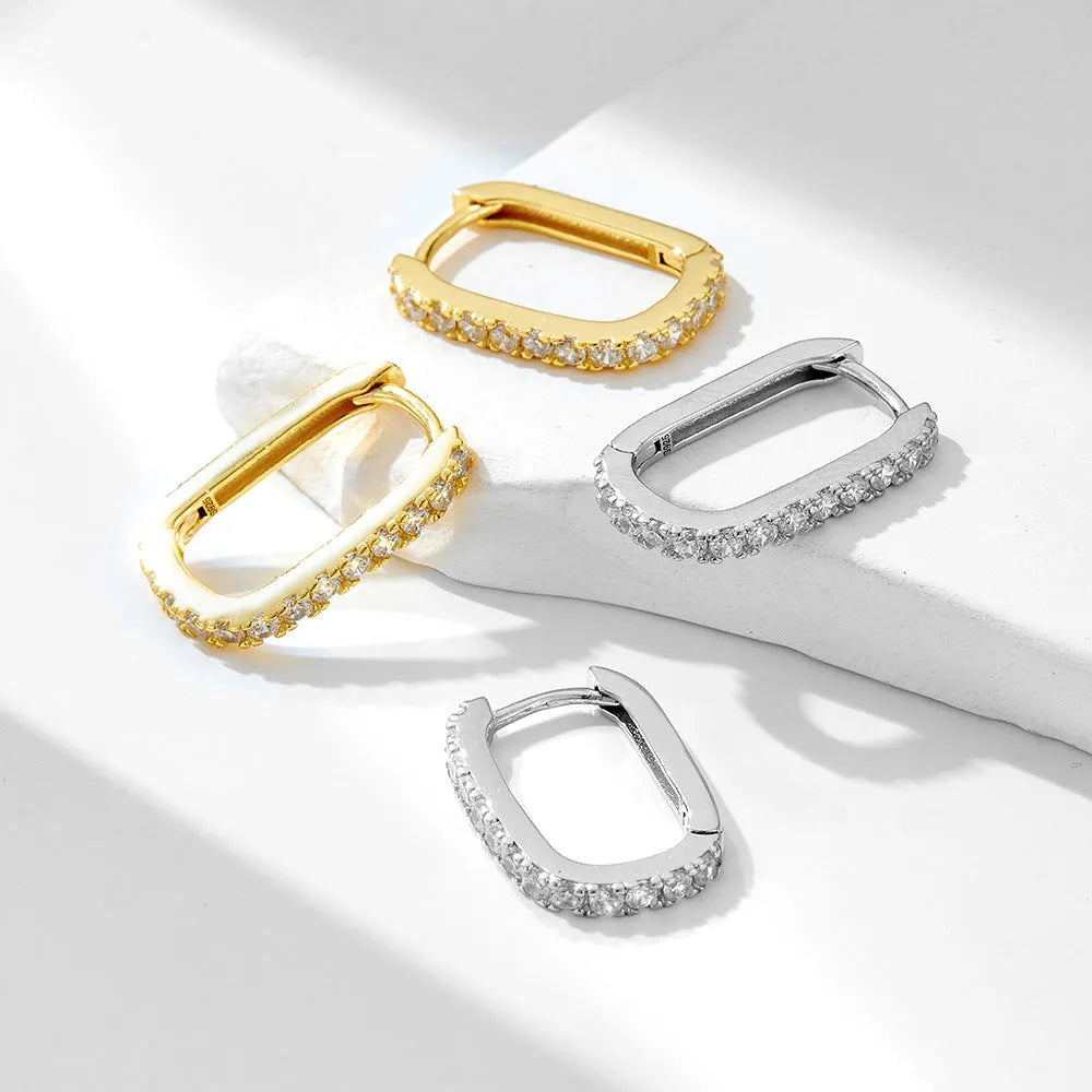 Sterling silver oval zircon geometric ear clip for women in white or yellow.