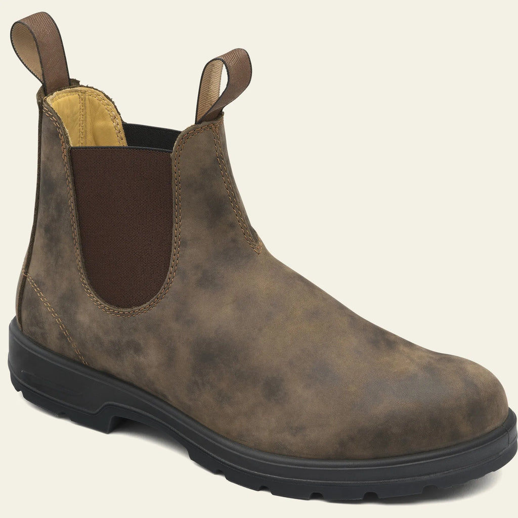 Brown vintage unisex Chelsea boot with car suture stitching and a round toe.