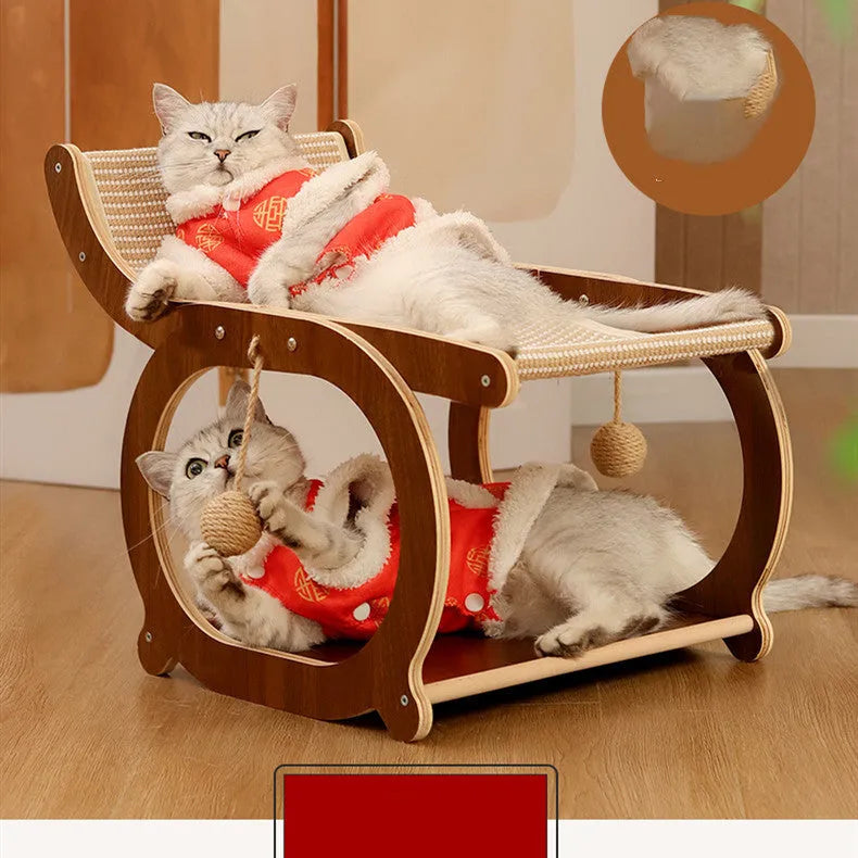 Solid wood frame cat bed with a light-coloured sisal scratching and lounging mat, shown on a wooden floor.