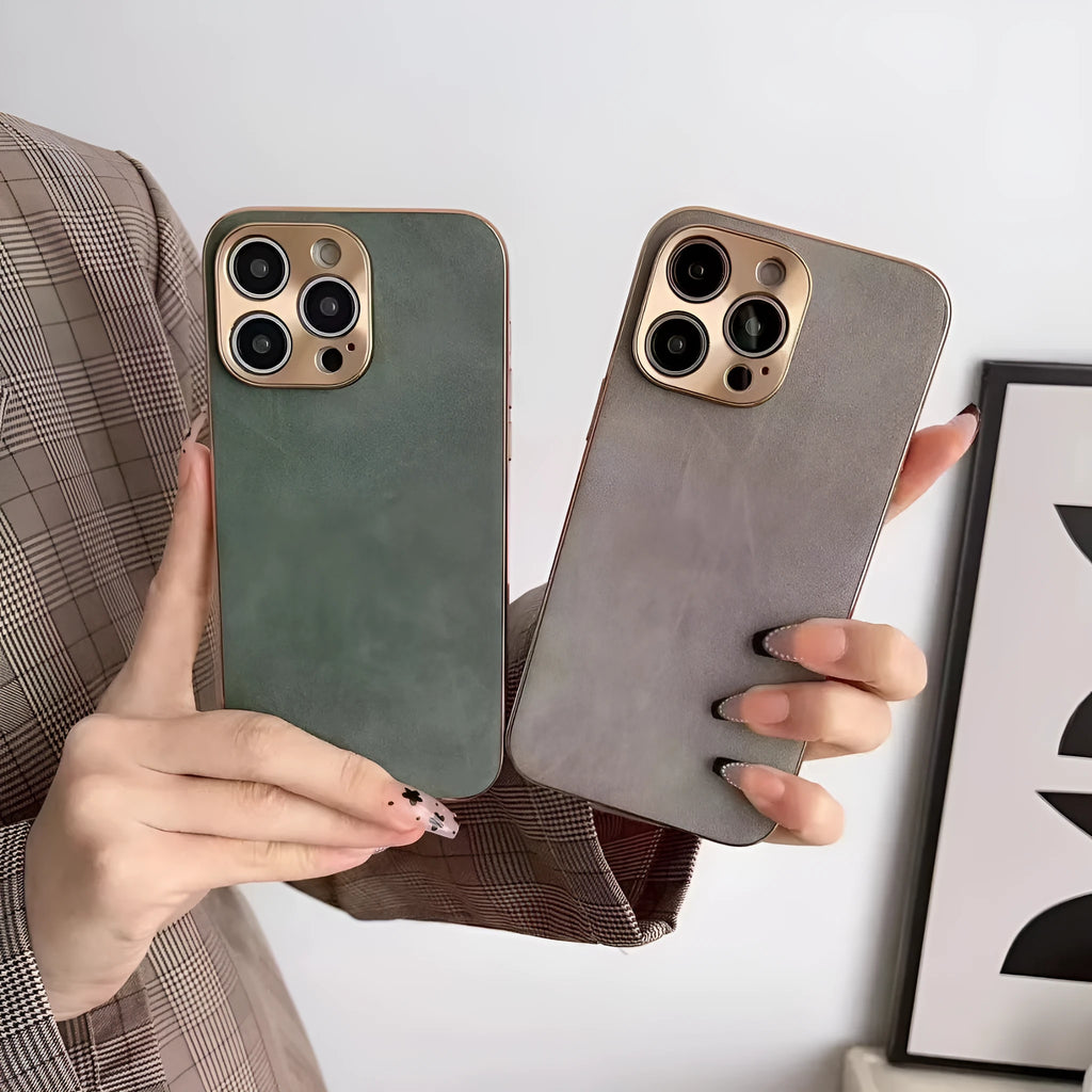 Leather-textured TPU phone case for iPhone on a table, showing colour and precise button cutouts.