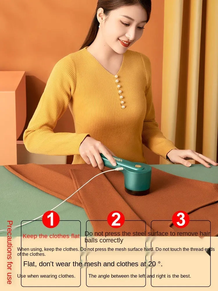 USB rechargeable hair ball trimmer for removing fabric pills from clothing and sofas.