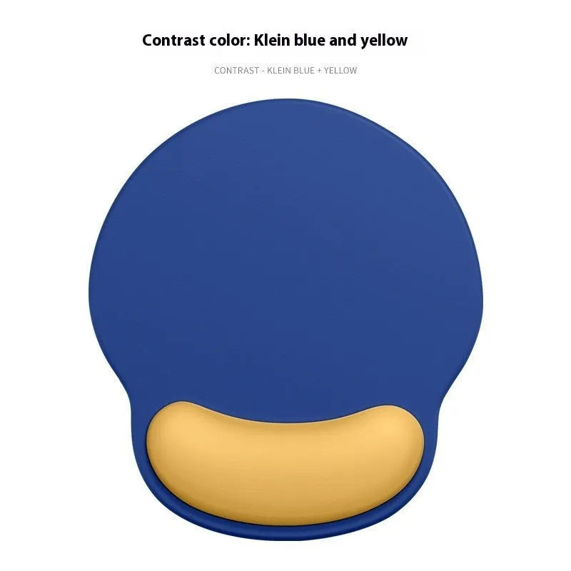 Silicone mouse mat with wristband in a gradient blue and black colour pattern.