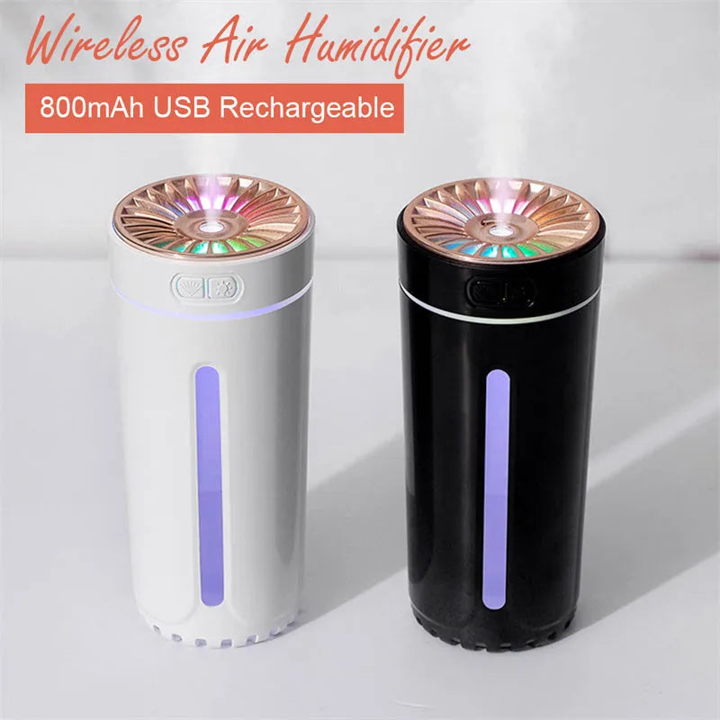 Black USB rechargeable car humidifier with colourful lights showing mist output, sized for cup holders