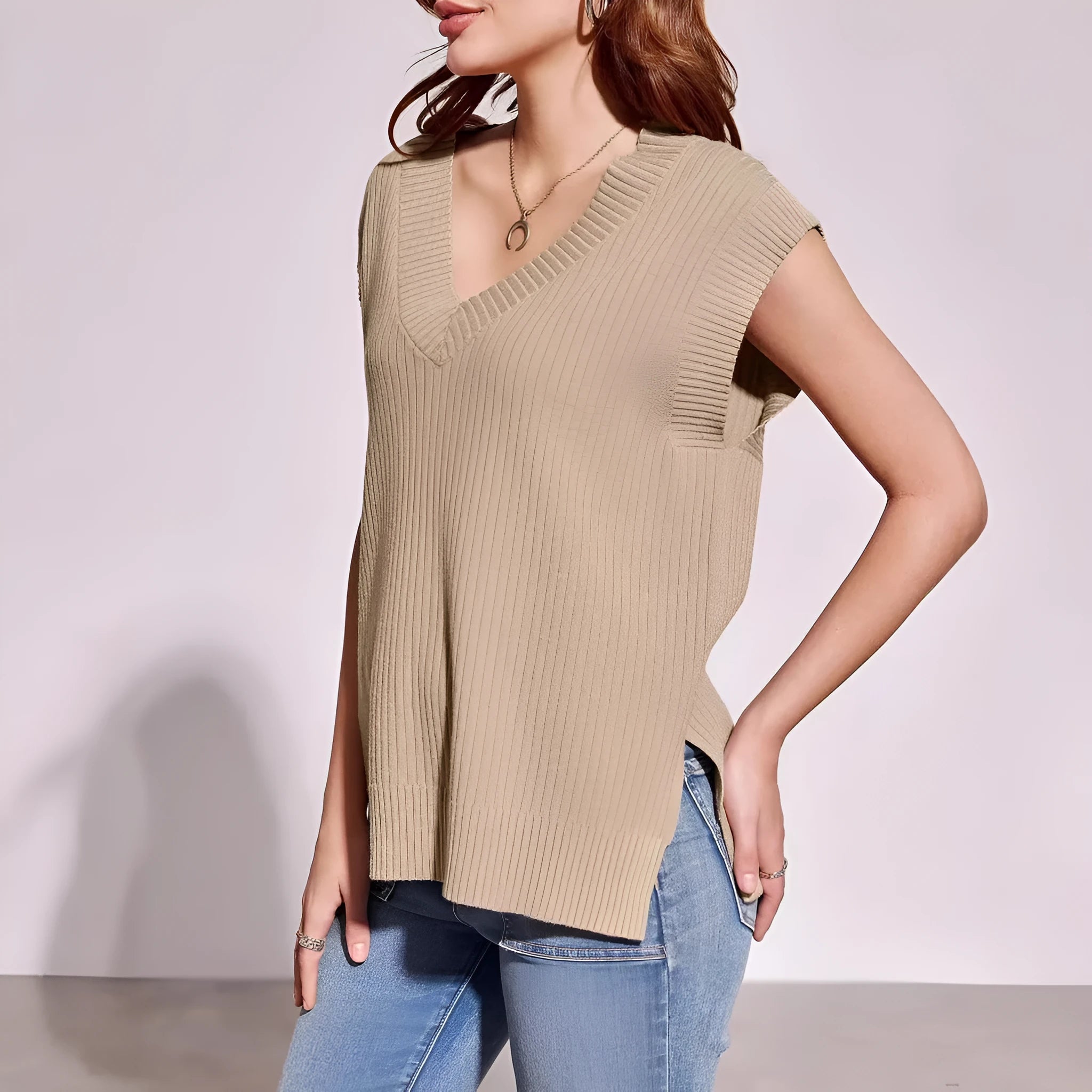 Camel and white v-neck sleeveless loose pullover vest in striped or plaid patterns