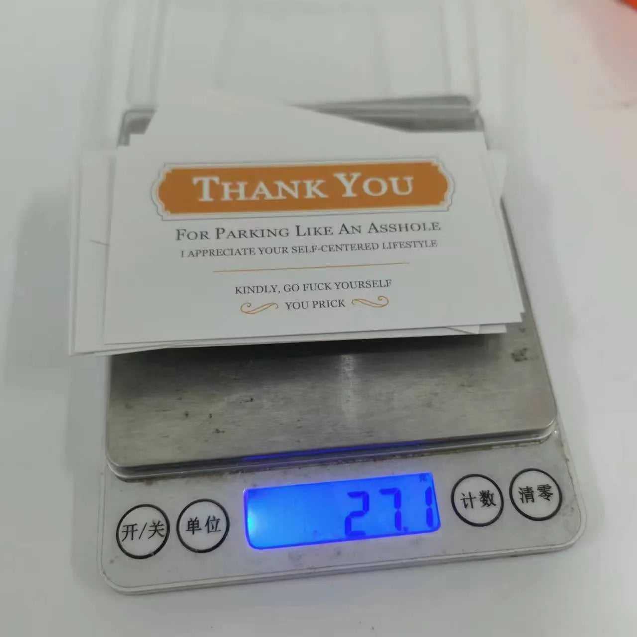 Illegal parking reminder card with middle finger design on paper with colour printing
