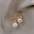 Mermaid pearl earrings for women with 14K gold finish and white pearl element