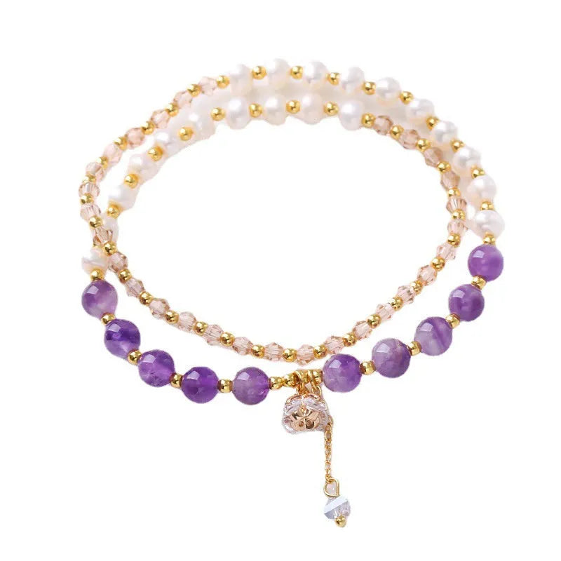 Natural freshwater pearl and crystal double ring bracelet in strawberry quartz, amethyst, or aquamarine.