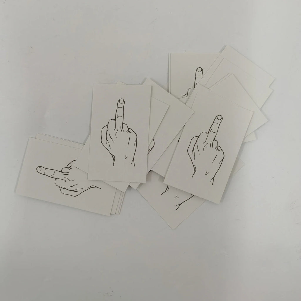 Illegal parking reminder card with middle finger design on paper with colour printing
