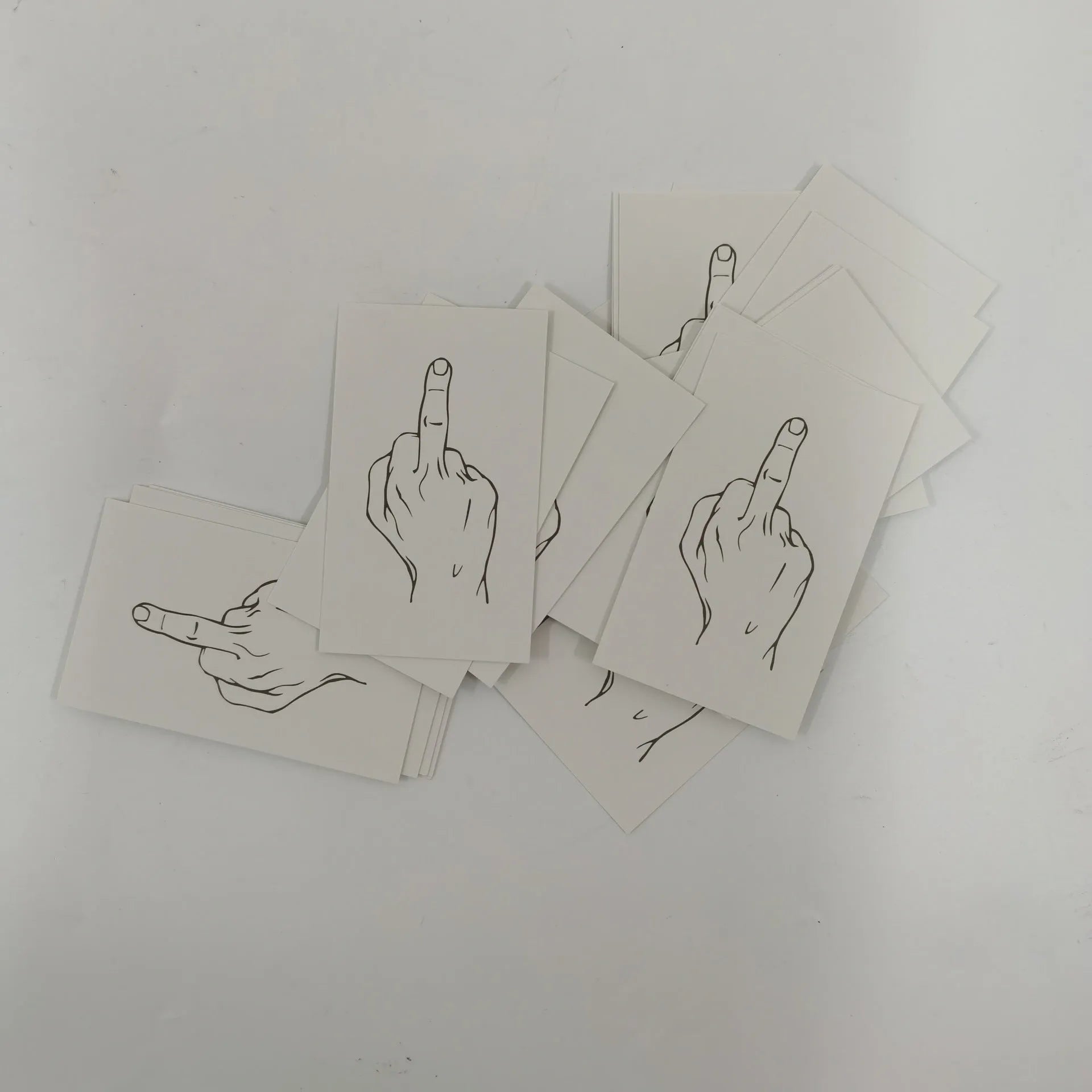Illegal parking reminder card with middle finger design on paper with colour printing