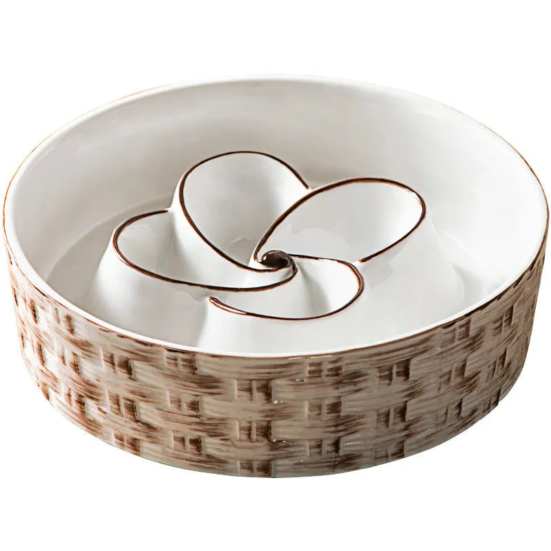 Blue ceramic slow feeder dog bowl with maze pattern and non-slip rubber base for large dogs.