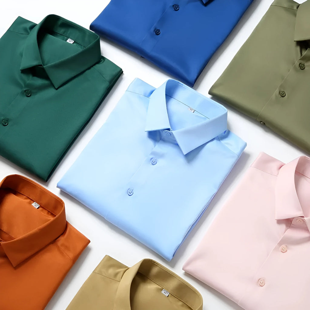 Men's solid colour long-sleeved shirt in a loose, non-ironing polyester and spandex fabric.