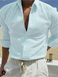 Men's striped cardigan lapel long sleeve shirt in polyester available in multiple colours.