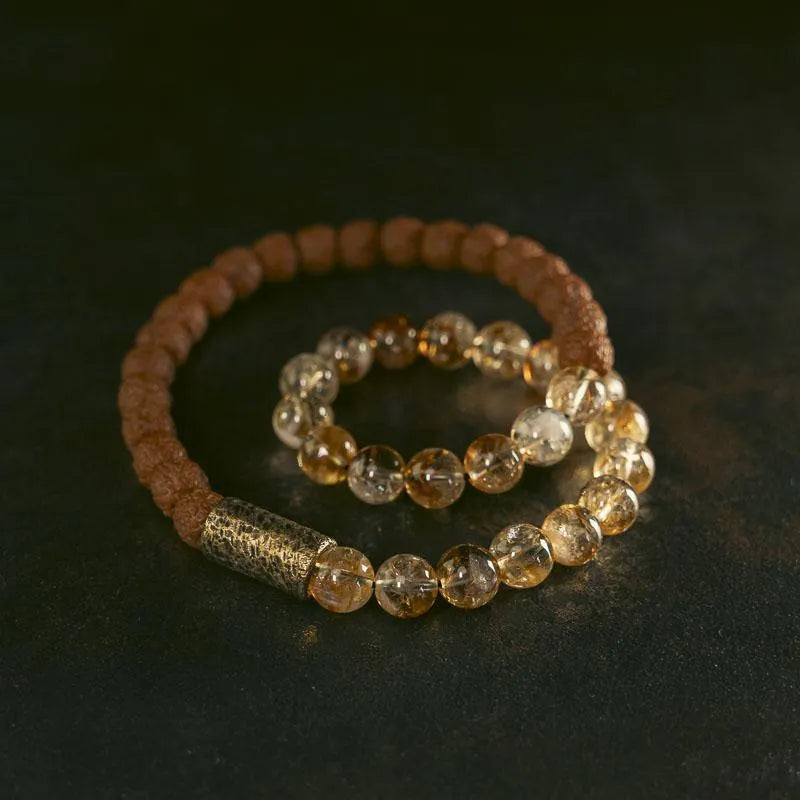 Personalised natural colour LCD double circle bracelet in citrine on a wrist.
