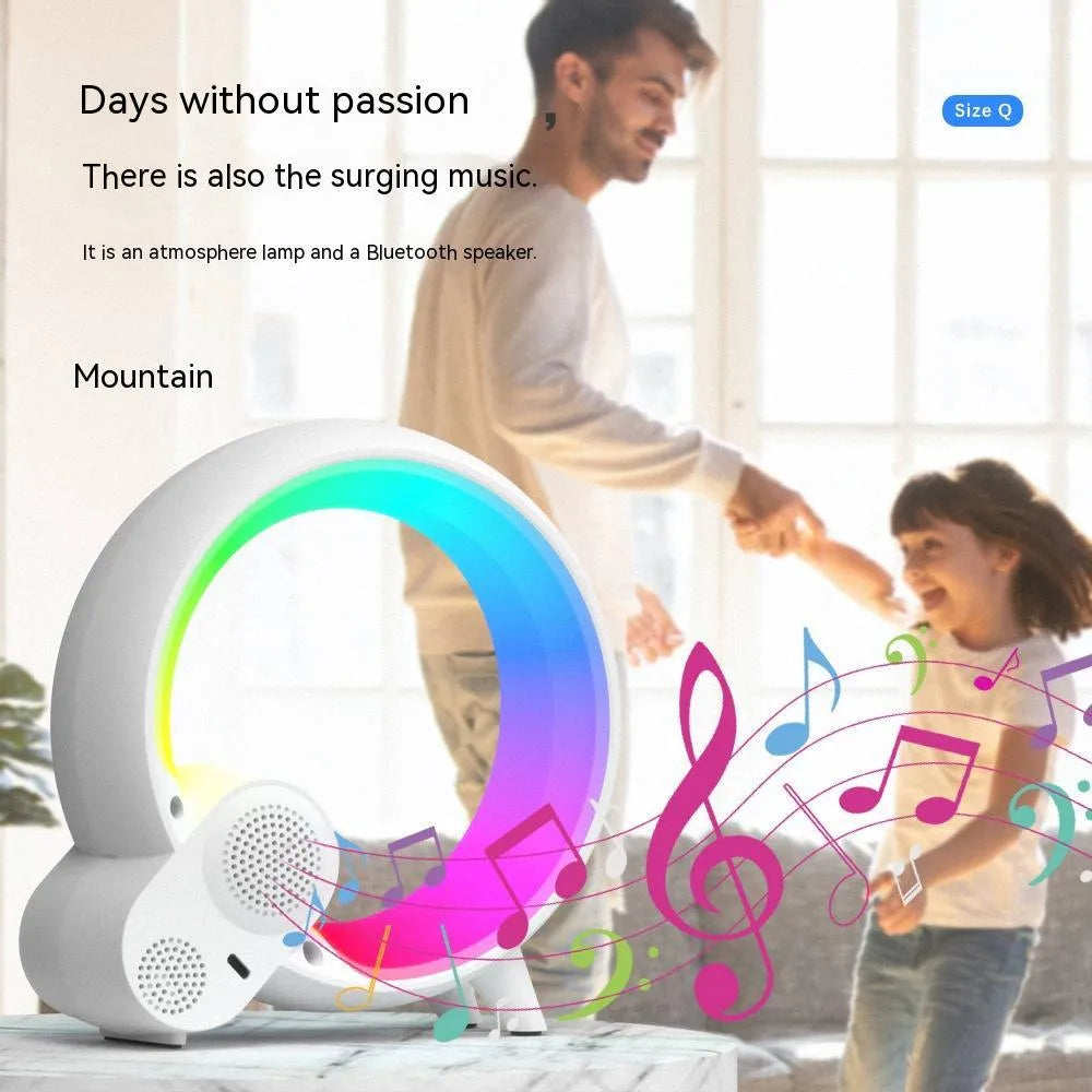 Creative Q Light sunrise alarm clock with digital display and colourful LED ring in black or white finish.