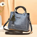 Simple Retro small horizontal square PU crossbody handbag for women in black with outer slit pocket